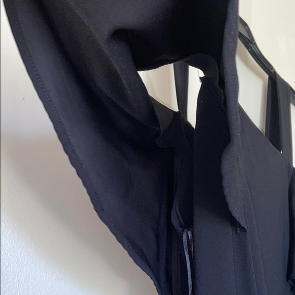 A black Asymmetrical dress. - Picture 4 of 5